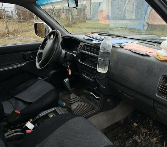 Зеленый Мицубиси Л 200, объемом двигателя 2.5 л и пробегом 264 тыс. км за 5537 $, фото 12 на Automoto.ua