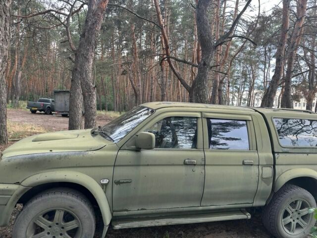 Зелений Міцубісі Л 200, об'ємом двигуна 2.5 л та пробігом 1000 тис. км за 5500 $, фото 1 на Automoto.ua