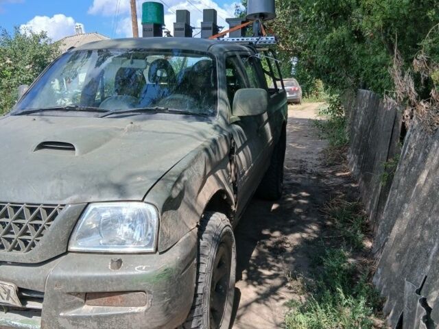 Зеленый Мицубиси Л 200, объемом двигателя 0 л и пробегом 130 тыс. км за 5500 $, фото 9 на Automoto.ua