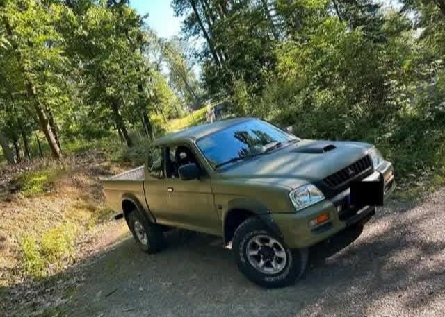 Зеленый Мицубиси Л 200, объемом двигателя 2.5 л и пробегом 259 тыс. км за 3597 $, фото 2 на Automoto.ua