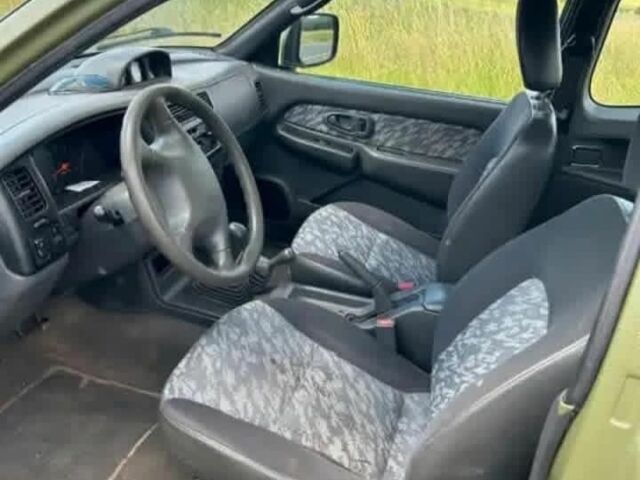 Зеленый Мицубиси Л 200, объемом двигателя 2.5 л и пробегом 259 тыс. км за 3597 $, фото 6 на Automoto.ua