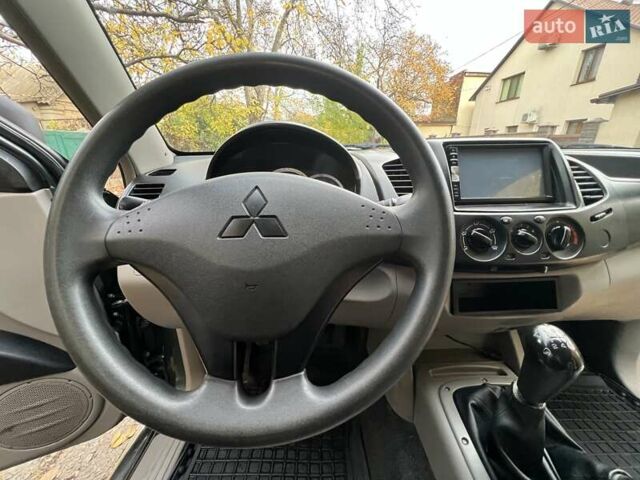 Мицубиси Л 200 2007 в Одессе на Automoto.ua Зеленый Мицубиси Л 200, объемом двигателя 2.5 л и пробегом 132 тыс. км за 12500 $, фото 8 на Automoto.ua
