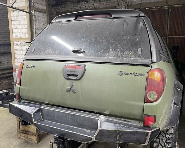 Зелений Міцубісі Л 200, об'ємом двигуна 2.5 л та пробігом 265 тис. км за 19000 $, фото 3 на Automoto.ua