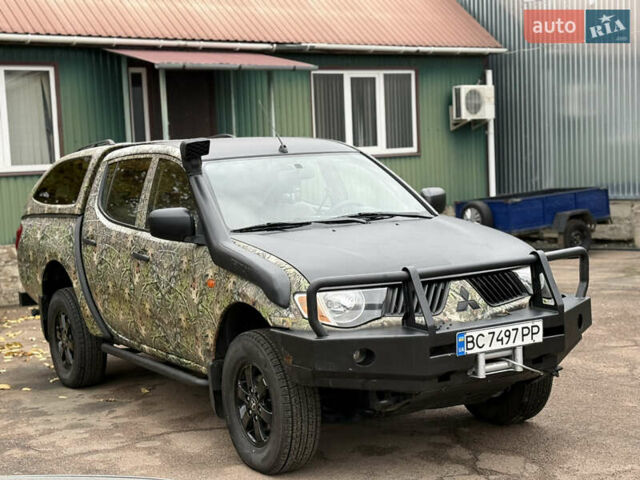 Зеленый Мицубиси Л 200, объемом двигателя 2.5 л и пробегом 362 тыс. км за 12300 $, фото 3 на Automoto.ua