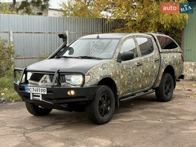 Зеленый Мицубиси Л 200, объемом двигателя 2.5 л и пробегом 362 тыс. км за 12300 $, фото 9 на Automoto.ua