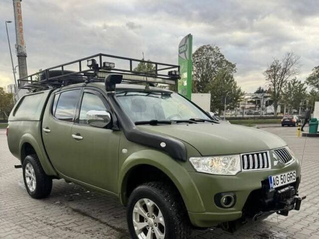 Зеленый Мицубиси Л 200, объемом двигателя 2.5 л и пробегом 242 тыс. км за 2900 $, фото 1 на Automoto.ua