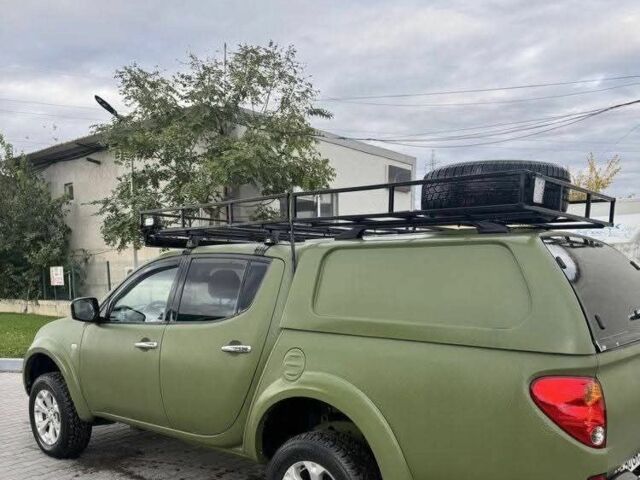 Зеленый Мицубиси Л 200, объемом двигателя 2.5 л и пробегом 242 тыс. км за 2900 $, фото 2 на Automoto.ua