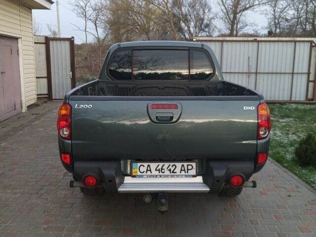 Зелений Міцубісі Л 200, об'ємом двигуна 2 л та пробігом 257 тис. км за 14500 $, фото 5 на Automoto.ua