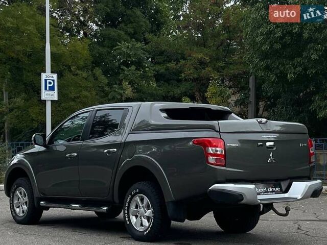 Зелений Міцубісі Л 200, об'ємом двигуна 2.44 л та пробігом 292 тис. км за 21499 $, фото 3 на Automoto.ua