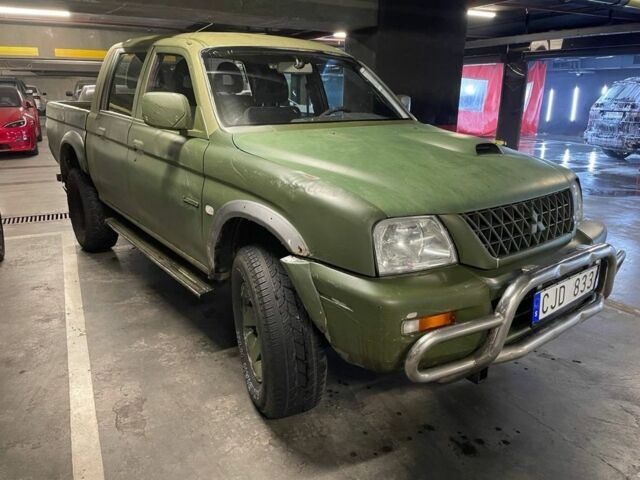 Зеленый Мицубиси Л 200, объемом двигателя 2.5 л и пробегом 125 тыс. км за 4200 $, фото 3 на Automoto.ua