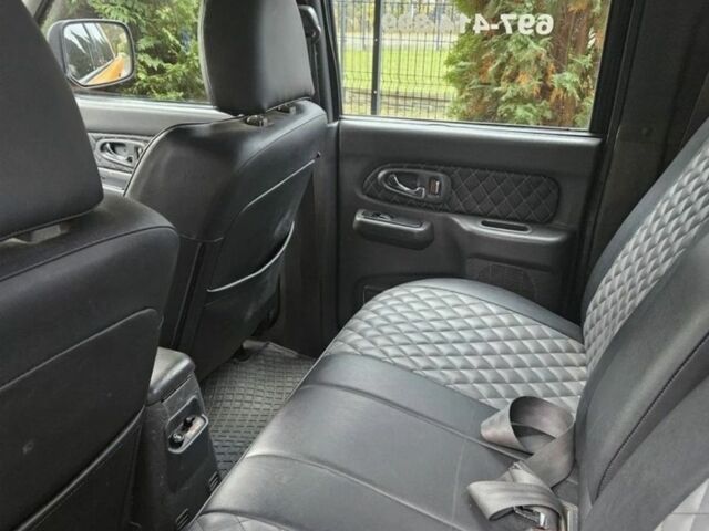 Мицубиси Л 200 2004 в Сумах на Automoto.ua Оранжевый Мицубиси Л 200, объемом двигателя 2.5 л и пробегом 199 тыс. км за 2864 $, фото 6 на Automoto.ua