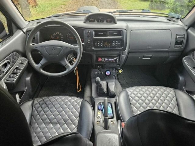 Мицубиси Л 200 2004 в Сумах на Automoto.ua Оранжевый Мицубиси Л 200, объемом двигателя 2.5 л и пробегом 199 тыс. км за 2864 $, фото 5 на Automoto.ua