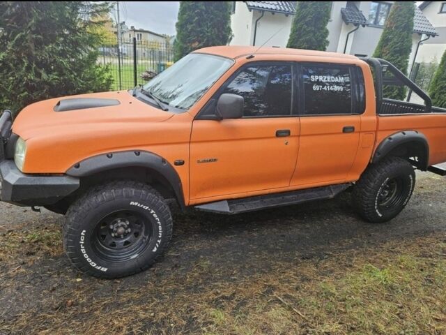 Мицубиси Л 200 2004 в Сумах на Automoto.ua Оранжевый Мицубиси Л 200, объемом двигателя 2.5 л и пробегом 199 тыс. км за 2864 $, фото 3 на Automoto.ua