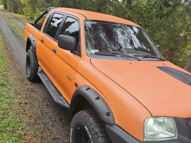 Мицубиси Л 200 2004 в Сумах на Automoto.ua Оранжевый Мицубиси Л 200, объемом двигателя 2.5 л и пробегом 199 тыс. км за 2864 $, фото 4 на Automoto.ua