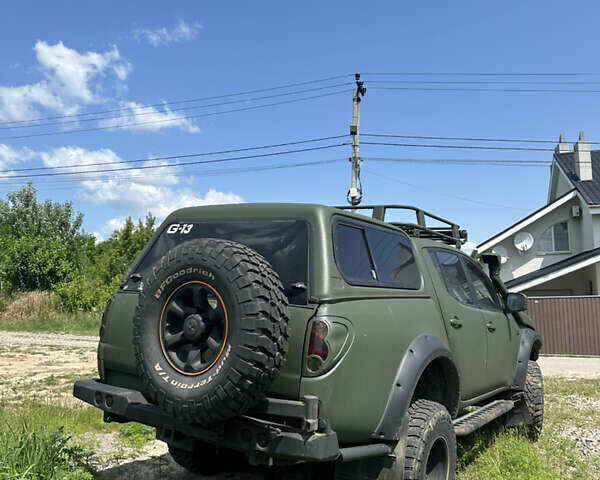 Оранжевый Мицубиси Л 200, объемом двигателя 2.48 л и пробегом 122 тыс. км за 18000 $, фото 2 на Automoto.ua