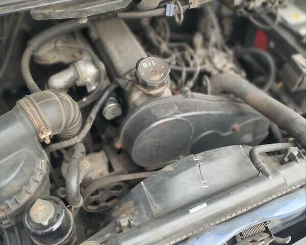 Синий Мицубиси Л 400, объемом двигателя 2.48 л и пробегом 310 тыс. км за 3700 $, фото 2 на Automoto.ua