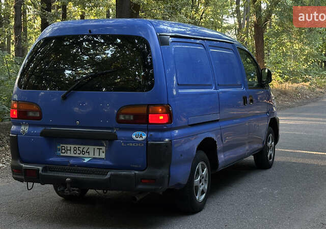 Синий Мицубиси Л 400, объемом двигателя 2.48 л и пробегом 347 тыс. км за 3800 $, фото 5 на Automoto.ua