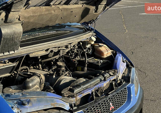 Синий Мицубиси Л 400, объемом двигателя 2.48 л и пробегом 347 тыс. км за 3800 $, фото 26 на Automoto.ua