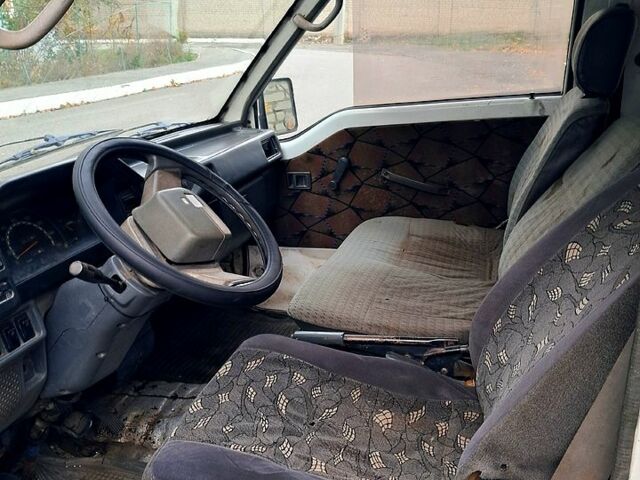 Білий Міцубісі Л300, об'ємом двигуна 2 л та пробігом 50 тис. км за 700 $, фото 2 на Automoto.ua