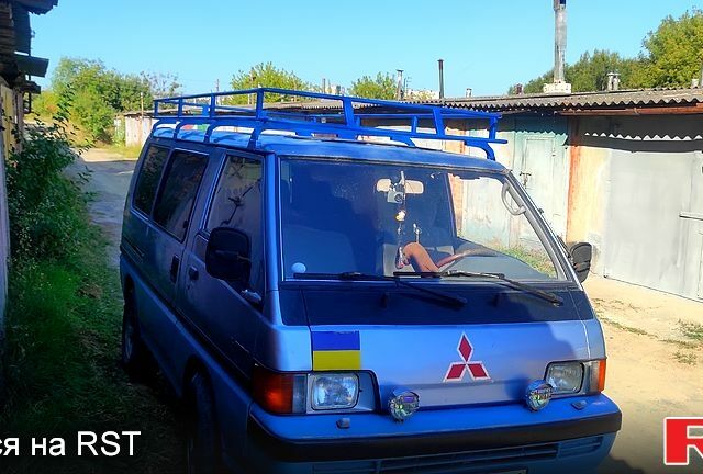 Синий Мицубиси Л300, объемом двигателя 2 л и пробегом 0 тыс. км за 3000 $, фото 1 на Automoto.ua