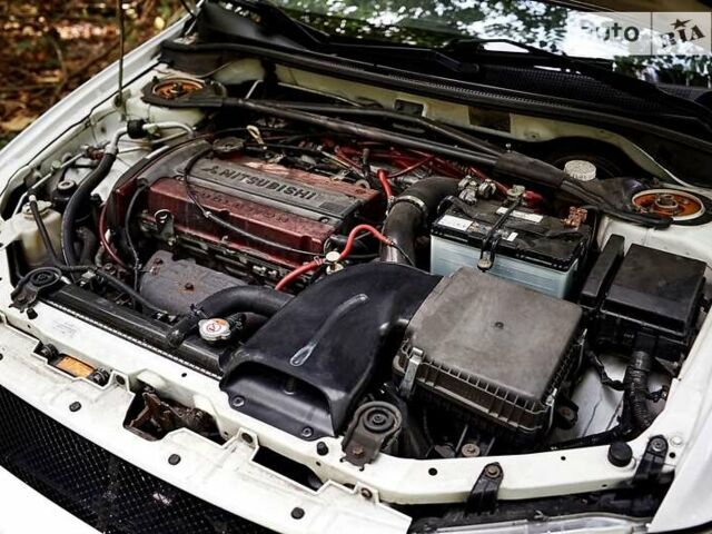 Білий Міцубісі Лансер Еволюшн, об'ємом двигуна 2 л та пробігом 169 тис. км за 25000 $, фото 23 на Automoto.ua