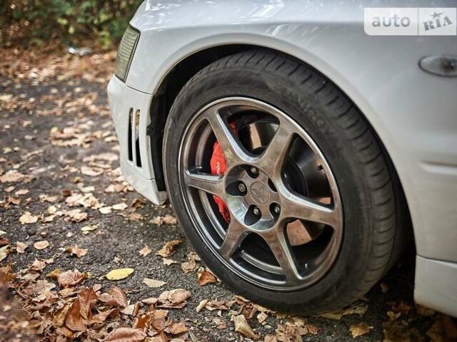 Білий Міцубісі Лансер Еволюшн, об'ємом двигуна 2 л та пробігом 169 тис. км за 25000 $, фото 11 на Automoto.ua