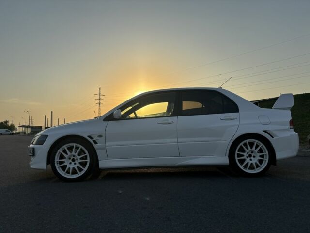 Белый Мицубиси Лансер Эволюшн, объемом двигателя 0 л и пробегом 179 тыс. км за 21499 $, фото 3 на Automoto.ua