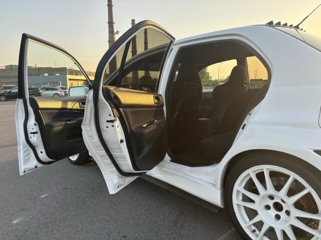 Белый Мицубиси Лансер Эволюшн, объемом двигателя 0 л и пробегом 179 тыс. км за 21499 $, фото 4 на Automoto.ua