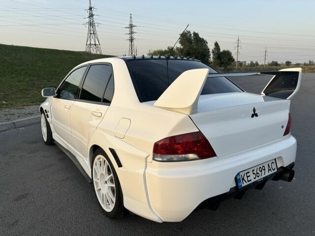 Белый Мицубиси Лансер Эволюшн, объемом двигателя 0 л и пробегом 179 тыс. км за 21499 $, фото 5 на Automoto.ua
