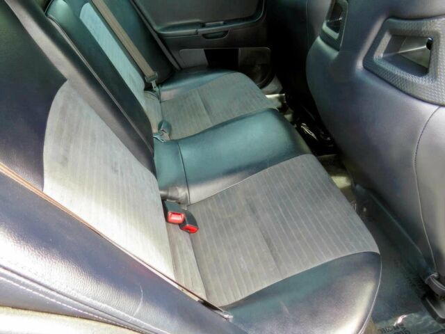 Белый Мицубиси Лансер Эволюшн, объемом двигателя 2 л и пробегом 86 тыс. км за 9900 $, фото 10 на Automoto.ua