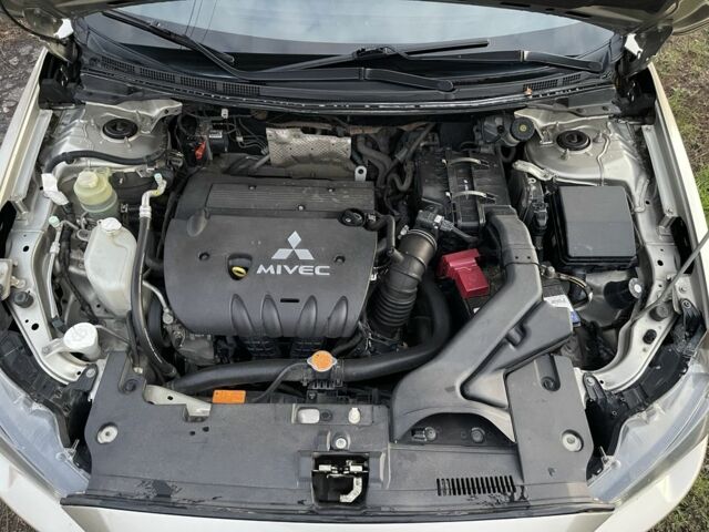 Бежевый Мицубиси Лансер Эволюшн, объемом двигателя 2 л и пробегом 155 тыс. км за 6950 $, фото 14 на Automoto.ua