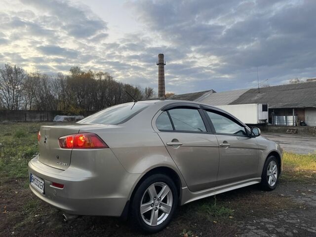 Бежевый Мицубиси Лансер Эволюшн, объемом двигателя 2 л и пробегом 155 тыс. км за 6950 $, фото 6 на Automoto.ua