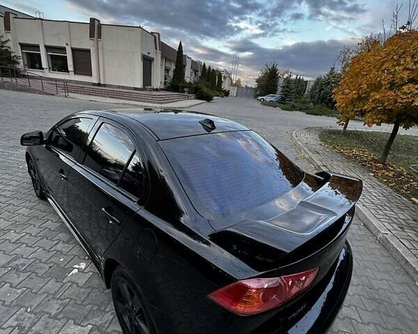 Черный Мицубиси Лансер Эволюшн, объемом двигателя 2 л и пробегом 276 тыс. км за 7300 $, фото 11 на Automoto.ua