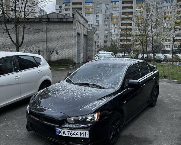 Черный Мицубиси Лансер Эволюшн, объемом двигателя 2 л и пробегом 276 тыс. км за 7300 $, фото 14 на Automoto.ua