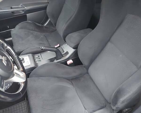 Черный Мицубиси Лансер Эволюшн, объемом двигателя 2 л и пробегом 116 тыс. км за 16900 $, фото 15 на Automoto.ua