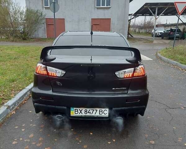 Черный Мицубиси Лансер Эволюшн, объемом двигателя 2 л и пробегом 116 тыс. км за 16900 $, фото 5 на Automoto.ua