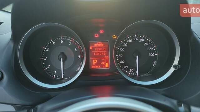 Черный Мицубиси Лансер Эволюшн, объемом двигателя 2 л и пробегом 134 тыс. км за 26737 $, фото 10 на Automoto.ua