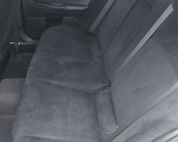 Черный Мицубиси Лансер Эволюшн, объемом двигателя 2 л и пробегом 116 тыс. км за 16900 $, фото 18 на Automoto.ua