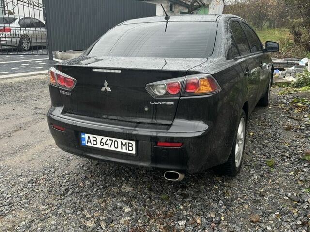 Черный Мицубиси Лансер Эволюшн, объемом двигателя 1.5 л и пробегом 252 тыс. км за 6100 $, фото 2 на Automoto.ua