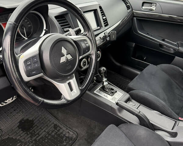 Червоний Міцубісі Лансер Еволюшн, об'ємом двигуна 2 л та пробігом 184 тис. км за 16500 $, фото 11 на Automoto.ua