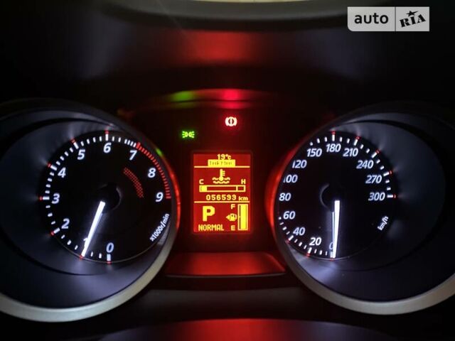 Красный Мицубиси Лансер Эволюшн, объемом двигателя 2 л и пробегом 56 тыс. км за 29000 $, фото 12 на Automoto.ua