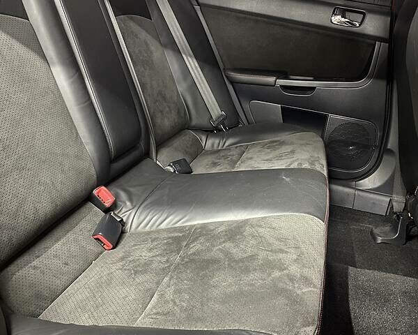 Красный Мицубиси Лансер Эволюшн, объемом двигателя 2 л и пробегом 56 тыс. км за 29000 $, фото 27 на Automoto.ua