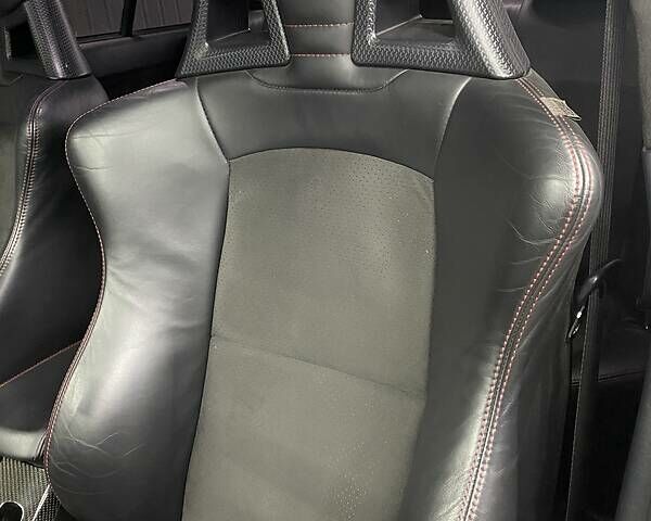 Красный Мицубиси Лансер Эволюшн, объемом двигателя 2 л и пробегом 56 тыс. км за 29000 $, фото 24 на Automoto.ua