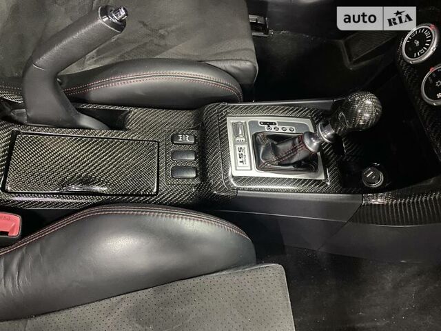 Красный Мицубиси Лансер Эволюшн, объемом двигателя 2 л и пробегом 56 тыс. км за 29000 $, фото 23 на Automoto.ua