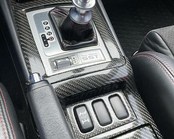 Красный Мицубиси Лансер Эволюшн, объемом двигателя 2 л и пробегом 56 тыс. км за 29000 $, фото 20 на Automoto.ua