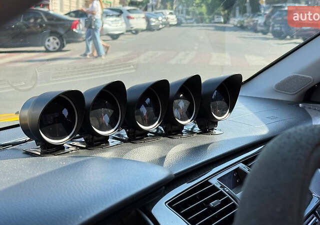 Жовтий Міцубісі Лансер Еволюшн, об'ємом двигуна 2 л та пробігом 124 тис. км за 32000 $, фото 11 на Automoto.ua