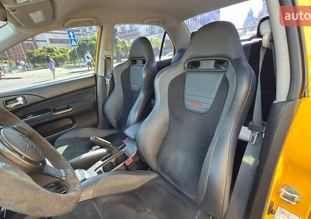 Жовтий Міцубісі Лансер Еволюшн, об'ємом двигуна 2 л та пробігом 124 тис. км за 32000 $, фото 22 на Automoto.ua