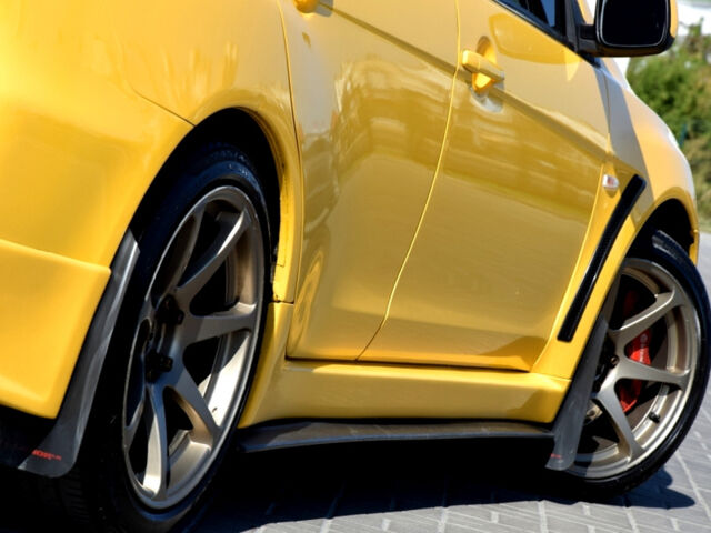 Желтый Мицубиси Лансер Эволюшн, объемом двигателя 2 л и пробегом 180 тыс. км за 24999 $, фото 25 на Automoto.ua