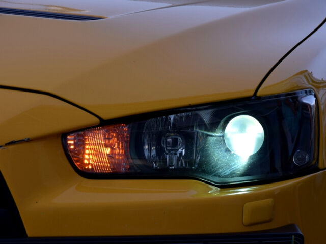 Желтый Мицубиси Лансер Эволюшн, объемом двигателя 2 л и пробегом 180 тыс. км за 24999 $, фото 86 на Automoto.ua