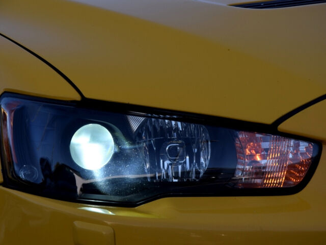 Желтый Мицубиси Лансер Эволюшн, объемом двигателя 2 л и пробегом 180 тыс. км за 24999 $, фото 87 на Automoto.ua